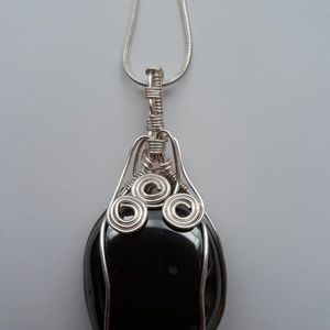 Black hematite wire wrapped pendant